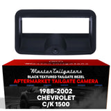 Black Chevrolet C/K 1500 1988-2002 tailgate bezel with backup camera, aftermarket tailgate handle by Master Tailgaters.