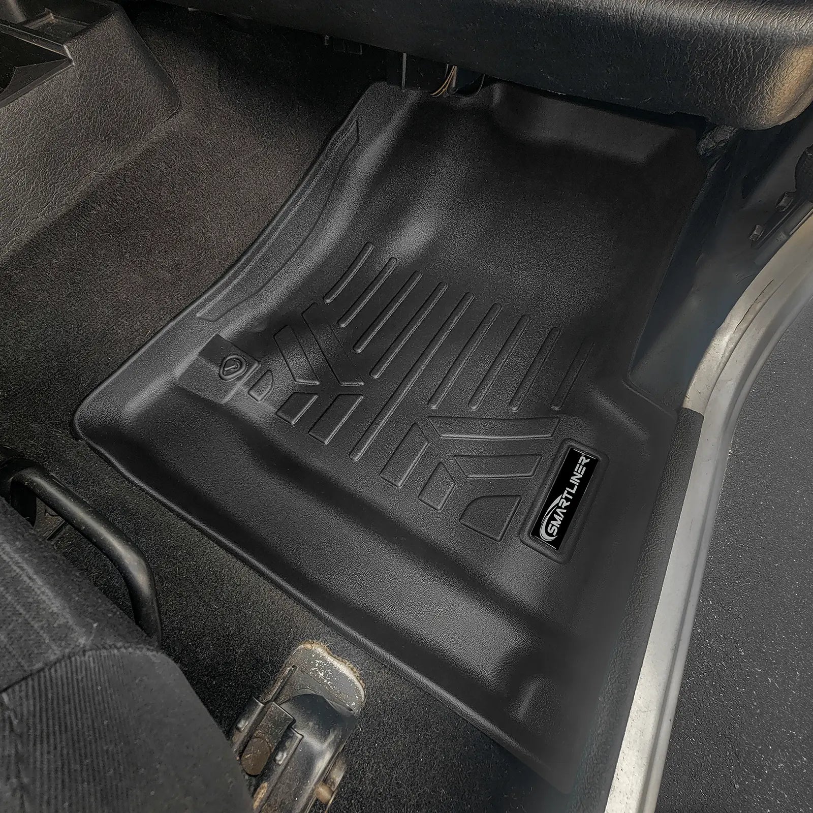 Smartliner USA custom fit floor liners for 1997-2006 Jeep Wrangler Unlimited, durable automotive interior floor mats.