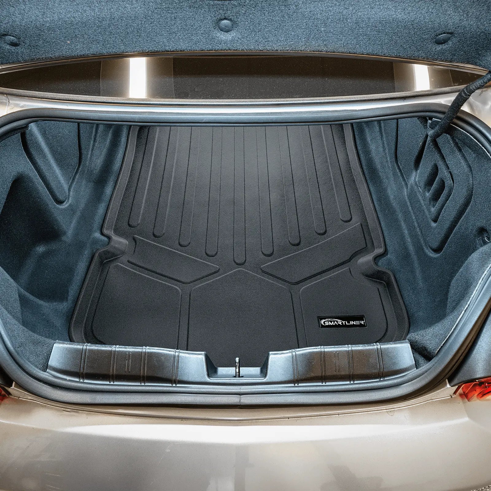 Smartliner USA custom fit floor liners for 2016-2025 Chevrolet Camaro coupe, showing black rubber mats with textured surface.