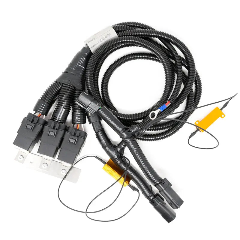Gen5DIY 15-22 Canyon DRL relocate kit with P&P harness and HID bulbs, showing installed wiring and components for headlight upgrade.