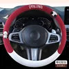 Universal leather steering wheel cover by Gm Service Guy, showing breathable design and snug fit on car steering wheel.
