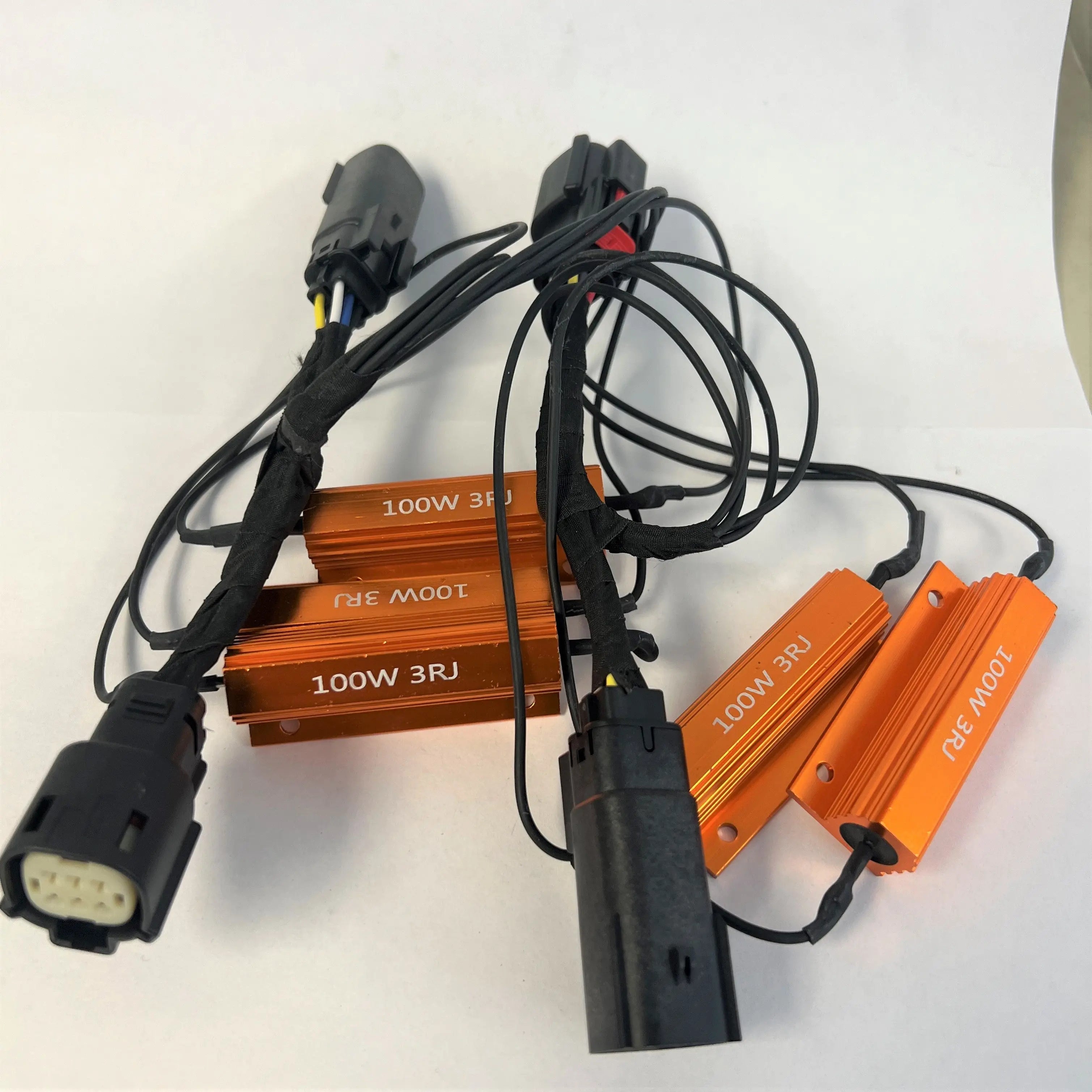 Chevrolet Tahoe and Suburban LED taillight harness by Gen5DIY, showing the wiring and connection components for vehicle lighting.
