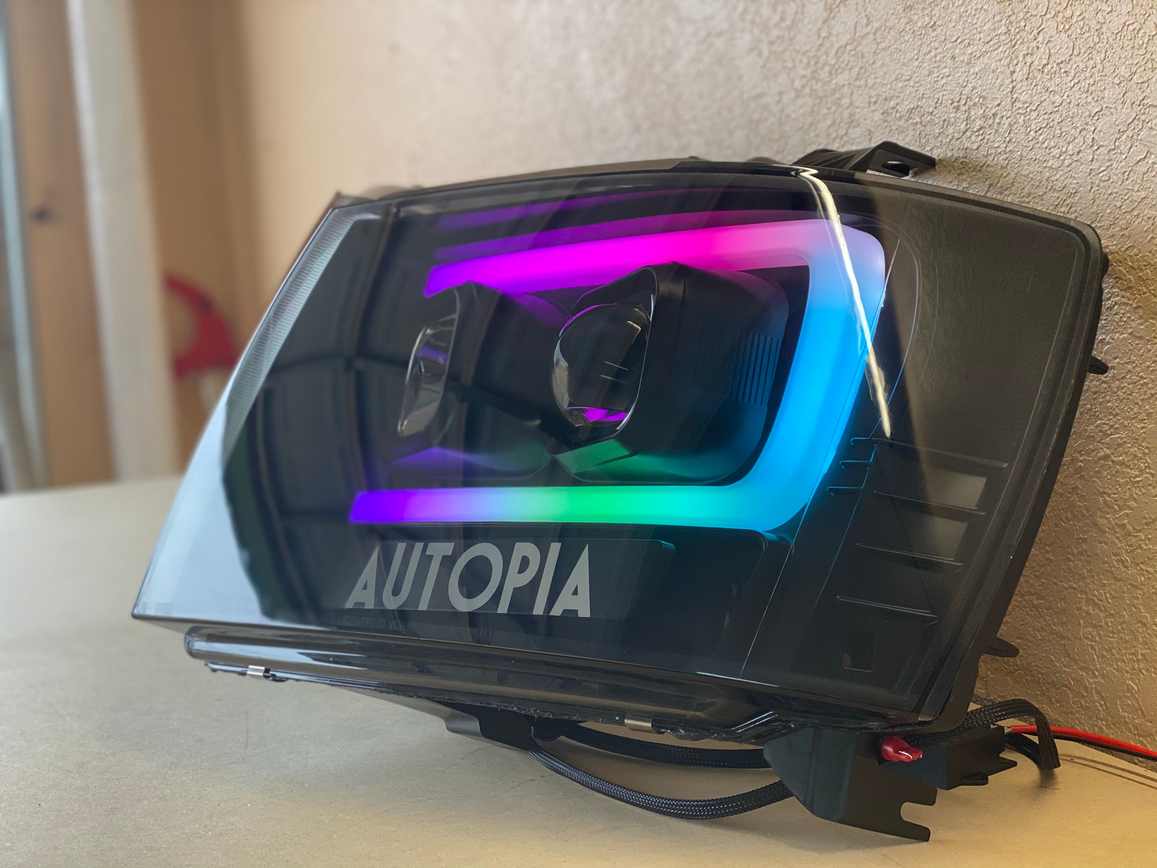 Colorshifting Spyder headlights for 2007-2014 Chevy Tahoe by NTXGlow, featuring vibrant color-changing lighting and clear lens design.