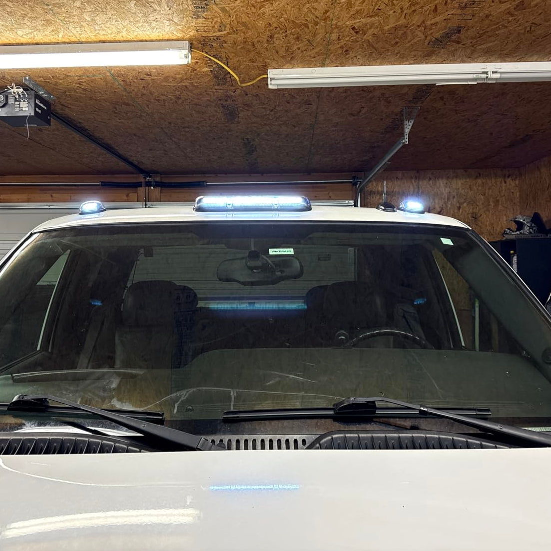 Smoked white and amber LED roof cab lights for 2000-2006 GMC Chevy HD trucks by AutoLEDTech.com, showing the exterior lights installed on the roof.