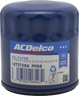 ACDelco GM Original Equipment PF48 oil filter with Gm Service Guy branding, showing the cylindrical filter element and packaging.