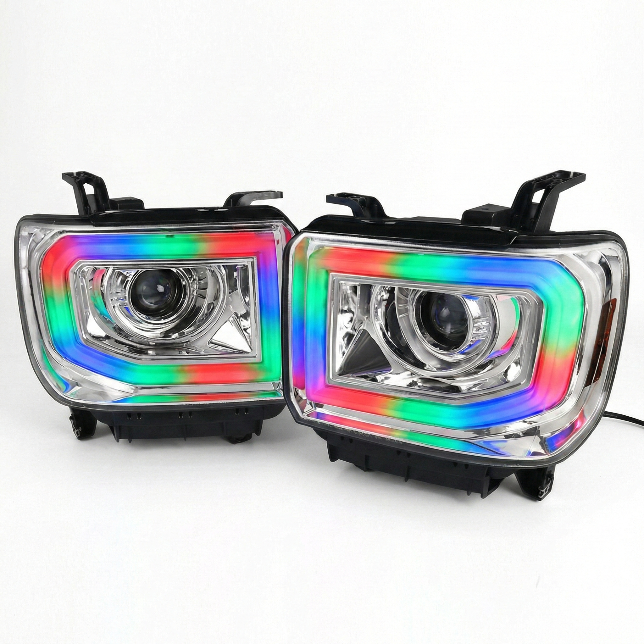 RGB headlights for 2014-2019 GMC Sierra 1500, 2500, 3500 by NTXGlow, showing illuminated multi-color LED lighting and headlight design.