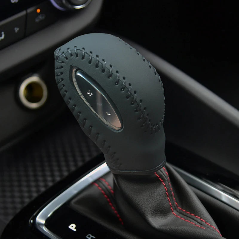 Cowhide and true carbon fiber gear shift knob cover for Buick Verano by Gm Service Guy, hand-sewn in six colors.