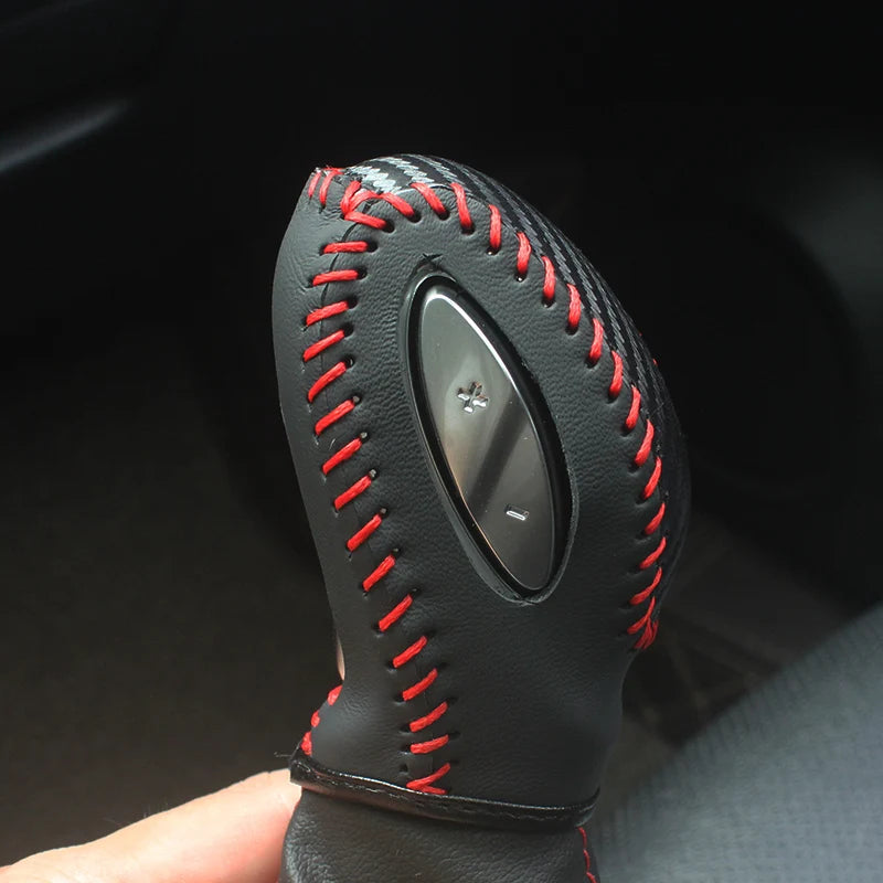 Hand-sewn cowhide and true carbon fiber gear shift knob cover for Buick Verano, featuring six color options, by Gm Service Guy.