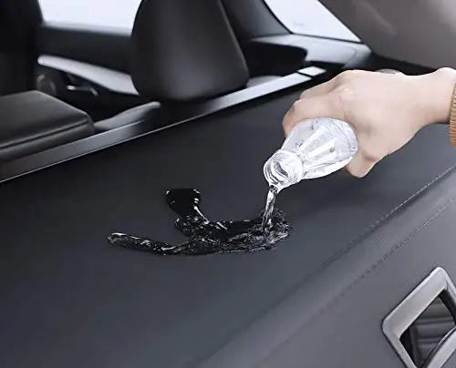 Gm Service Guy carbon fiber retractable trunk cargo cover for Buick GL6 in three colors, shown extended inside the vehicle trunk.