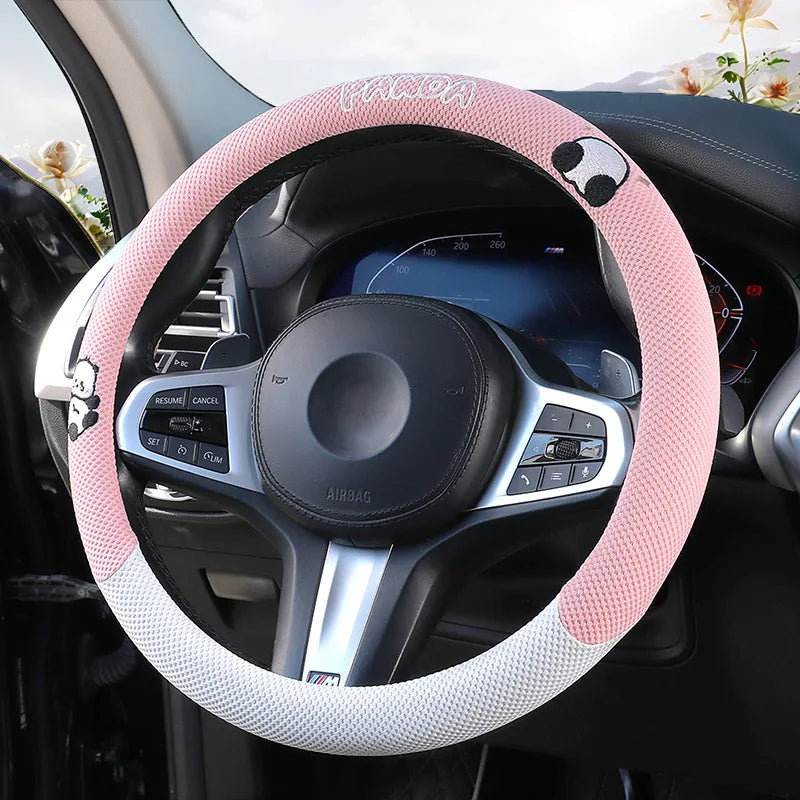 Breathable universal leather steering wheel cover by Gm Service Guy, showing its textured, comfortable fit for car steering wheels.
