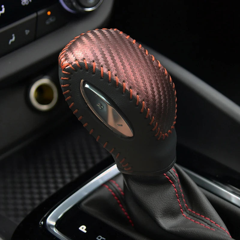 Hand-sewn Cowhide and True Carbon Fiber gear shift knob cover for Buick Verano by Gm Service Guy, available in six colors.