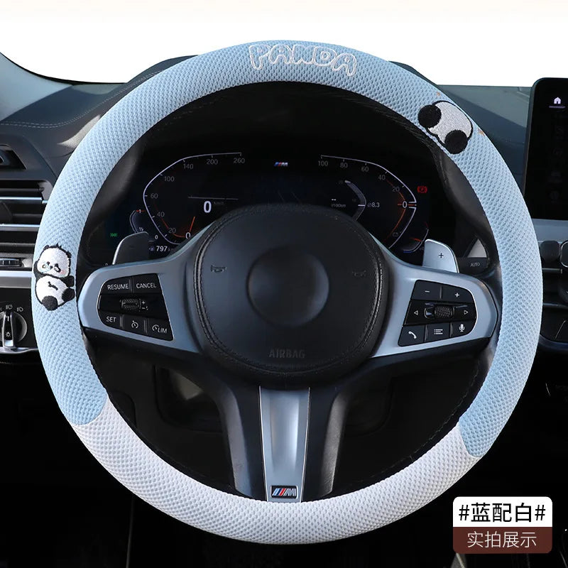 Breathable leather steering wheel cover by Gm Service Guy, featuring a cute universal design for car interiors.