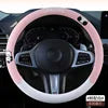 Breathable universal leather steering wheel cover by Gm Service Guy, designed for comfortable grip in cars.