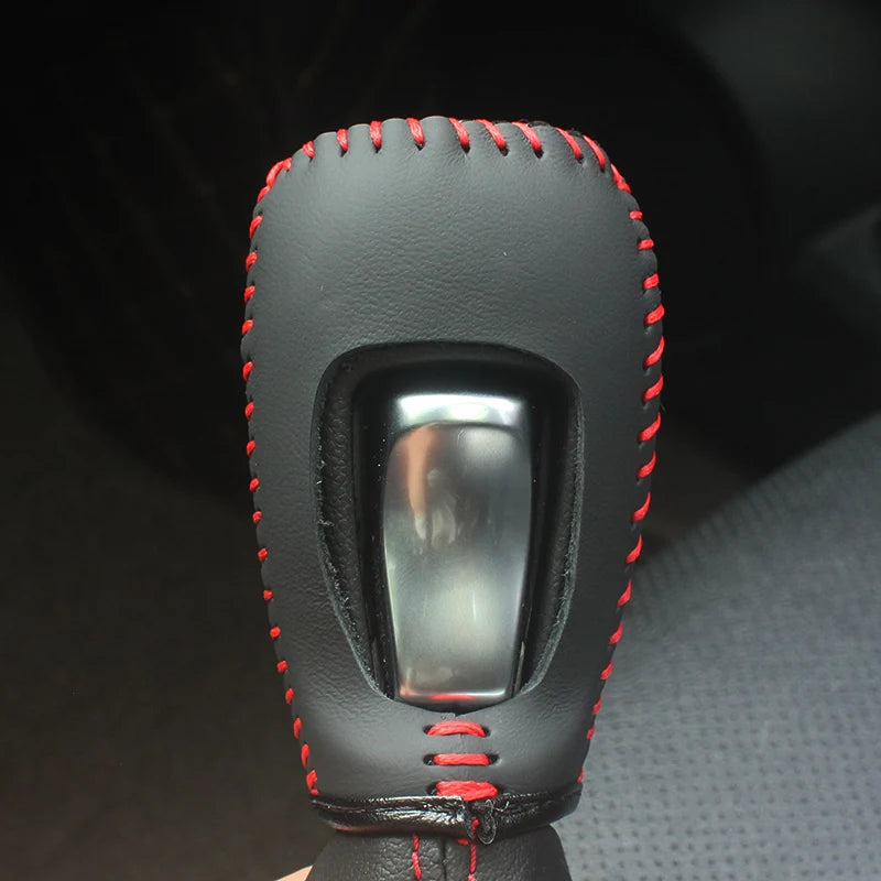 Hand-sewn cowhide and carbon fiber gear shift knob cover for Buick Verano, in six color options, by Gm Service Guy.