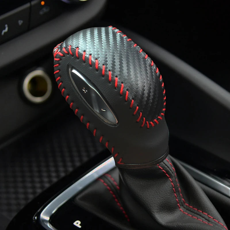 Hand-sewn cowhide and true carbon fiber gear shift knob cover for Buick Verano, available in six colors by Gm Service Guy.
