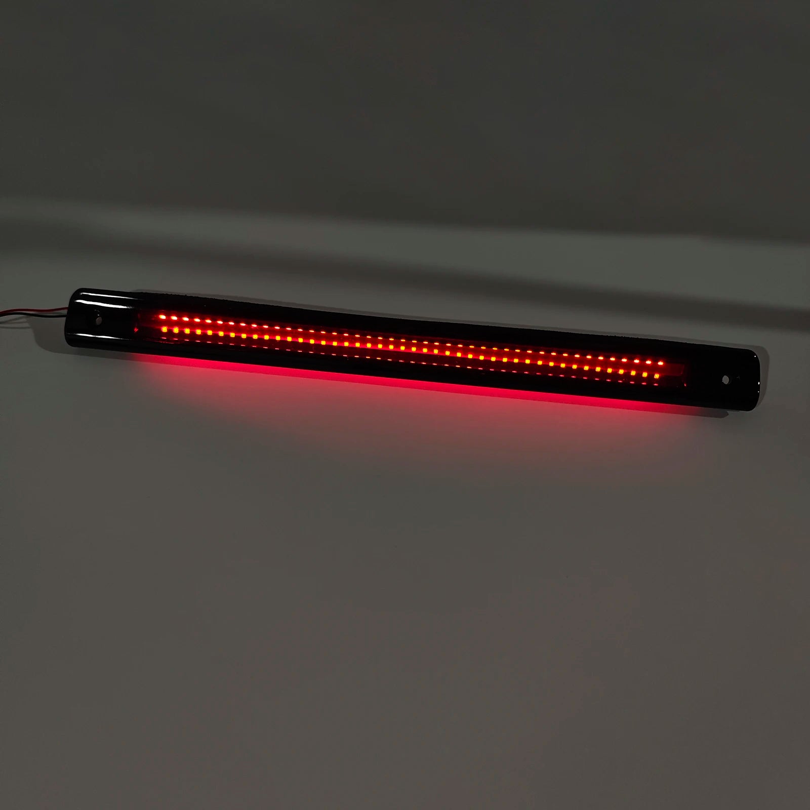 GM Service Guy 3rd brake light for Buick, Chevy, Oldsmobile, Pontiac, Saturn van, featuring a clear lens and durable housing.