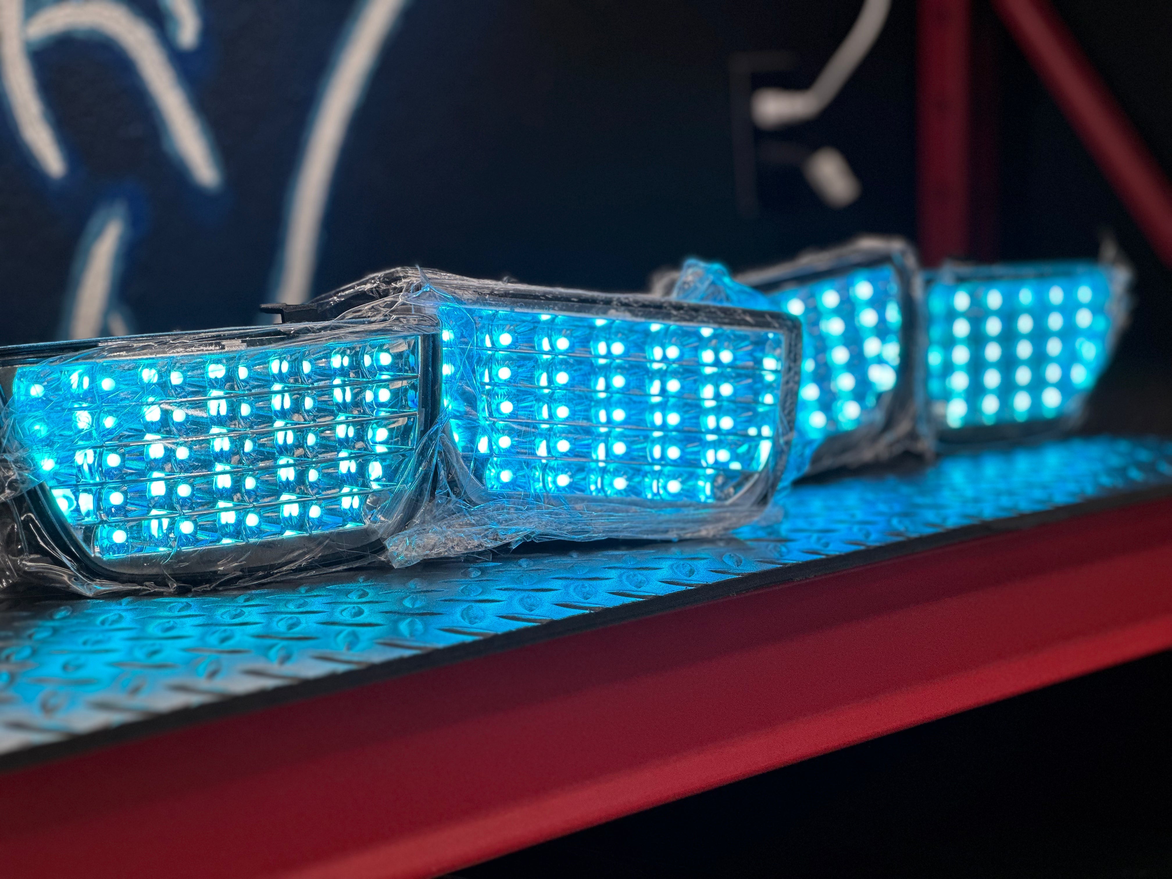 2010-2013 Chevy Camaro RGB chrome tail lights by NTXGlow, showcasing sleek, reflective design with vibrant lighting elements