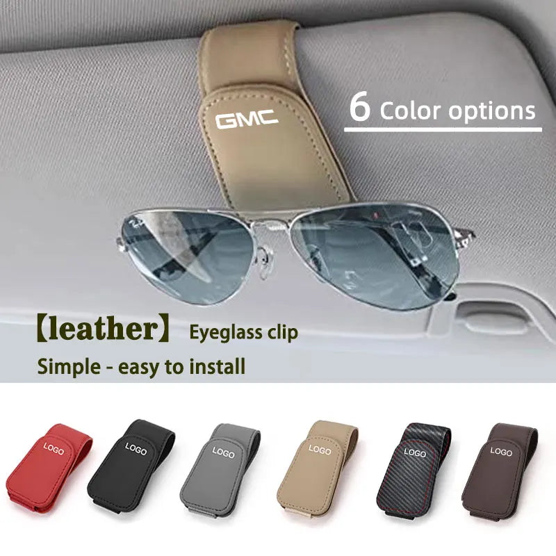 GMC car sunglass holder for Terrain, Sierra, Yukon, Acadia, Hummer, and more, with GM Service Guy branding and vehicle ornament design.
