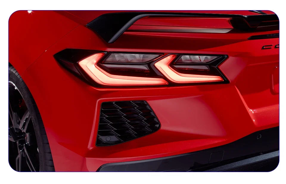Chevrolet Camaro 2014-2020 rear tail light assembly with LED brake, turn signals, and highlight accents, installed on vehicle