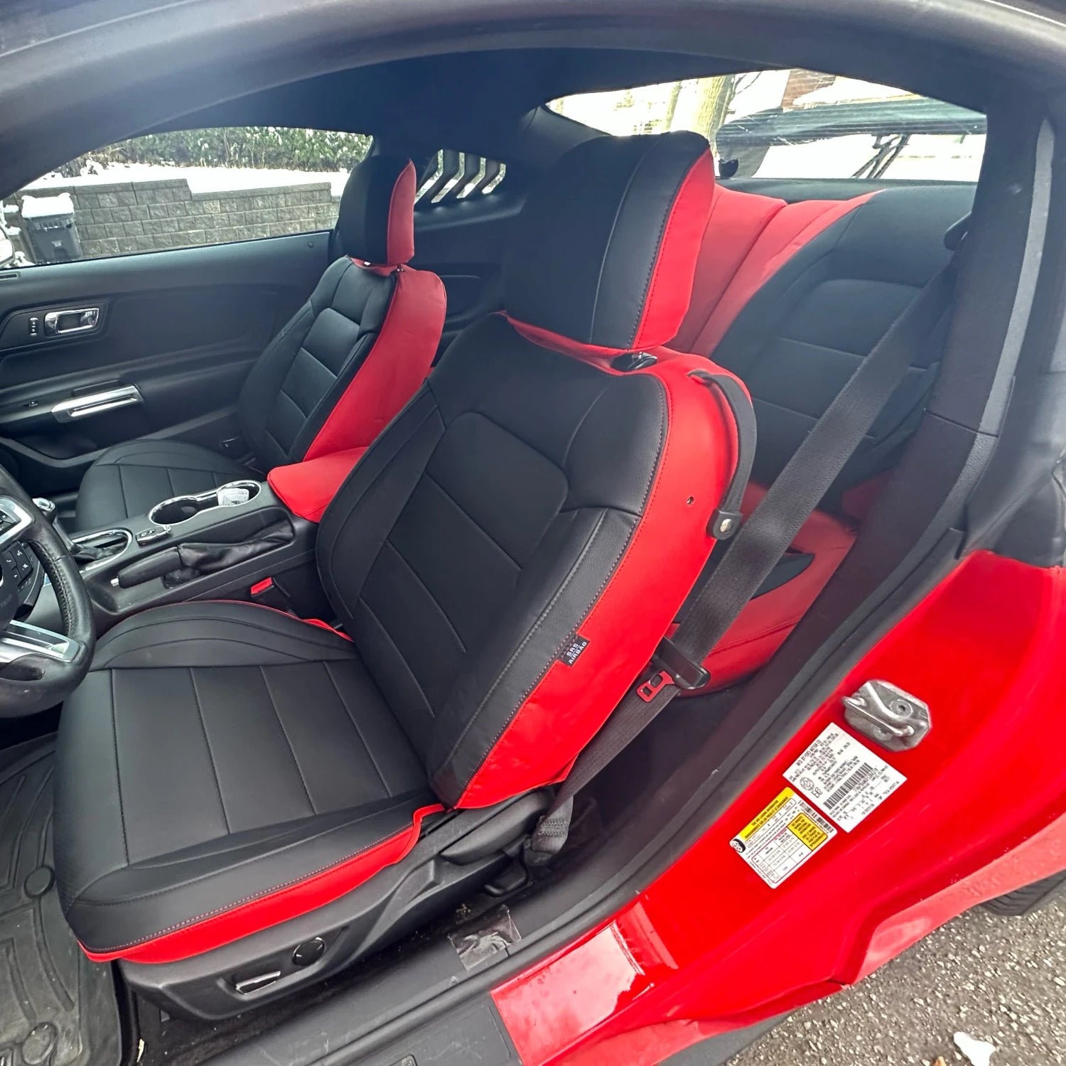 Set of custom-fit Chevrolet Camaro seat covers in premium artificial leather, designed for 2016-2024 models, by Gm Service Guy.