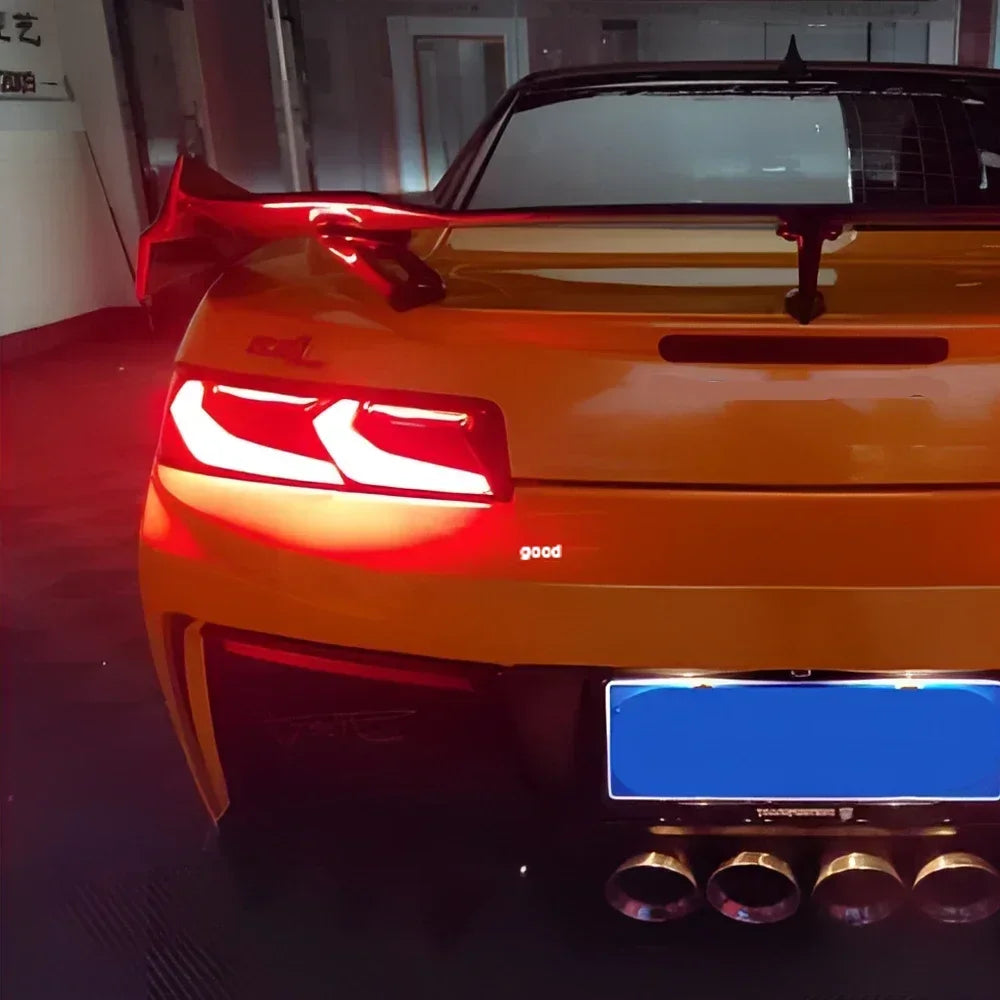 Chevrolet Camaro 2014-2020 rear LED taillights assembly with upgraded turn and brake lights, featuring bright highlight accents.