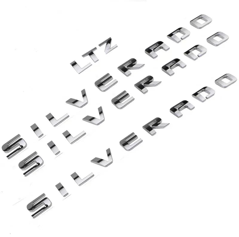 Silver Chevrolet Silverado LTZ ABS emblem badge with GM Service Guy logo for truck fender styling and nameplate decoration.