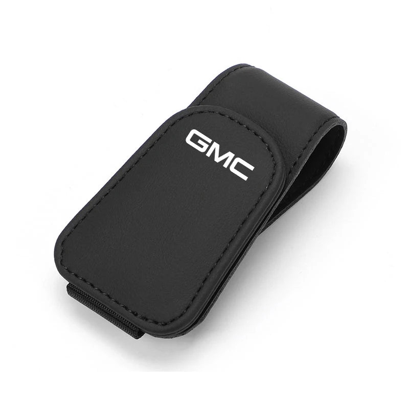 GMC car sunglasses holder for Terrain, Sierra, Yukon, Acadia, Hummer, Jimmy, and other GM vehicles, mounted on the vehicle interior.