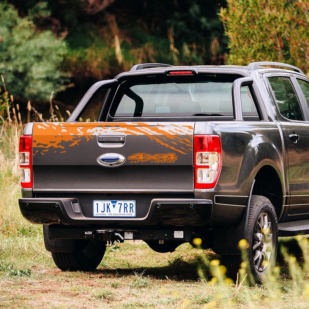 Universal 4x4 off-road tailgate decal for trucks like Ford Ranger, Isuzu D-Max, Chevrolet, VW Amarok, Toyota Hilux, with rugged design