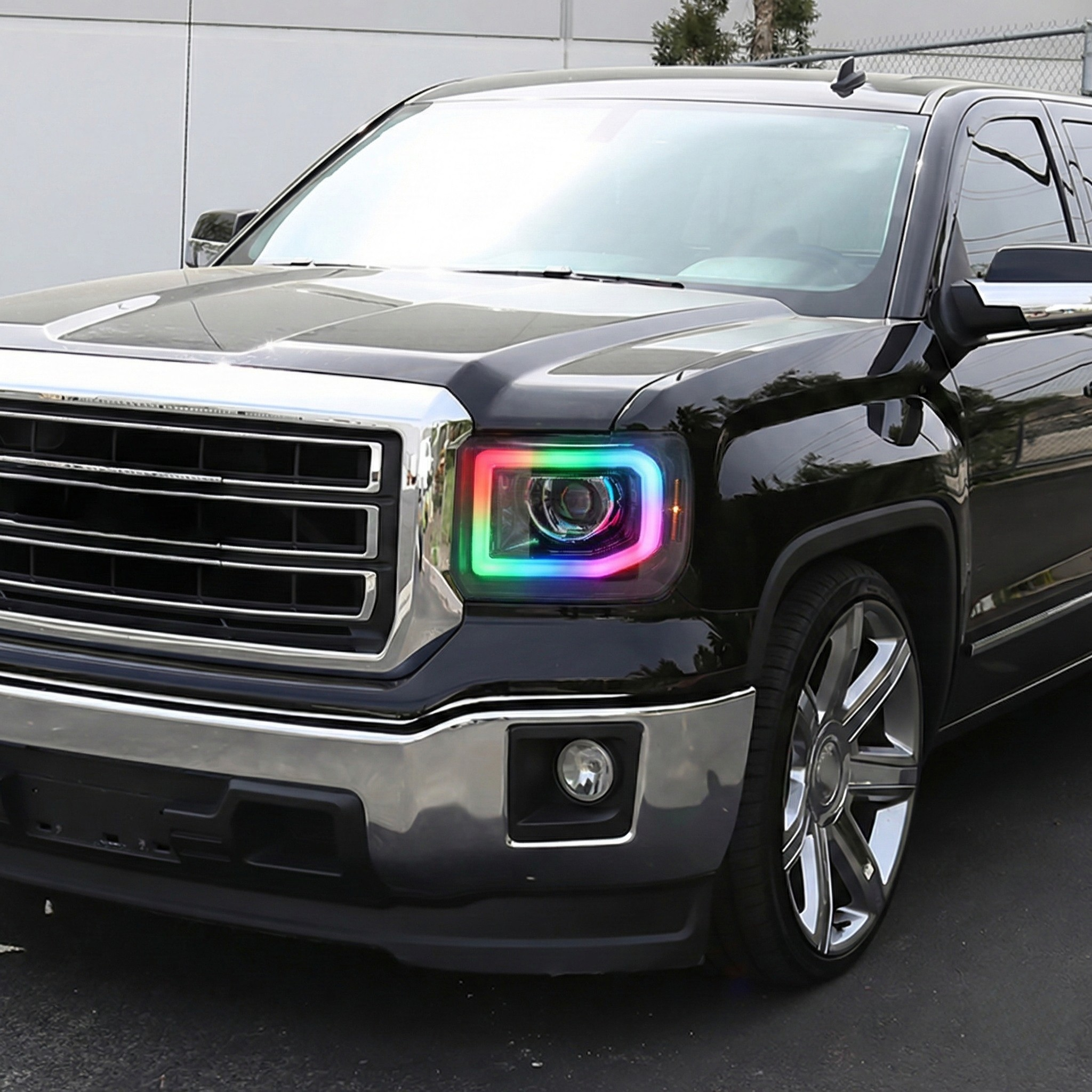 NTXGlow RGB headlights for 2014-2019 GMC Sierra 1500, 2500, 3500 with vibrant multicolor LED lighting and modern design