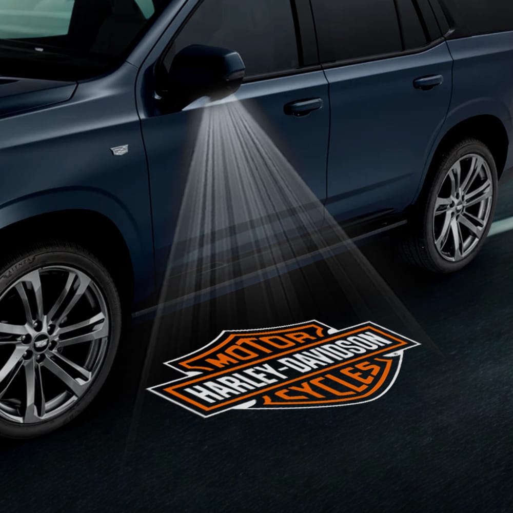 Pair of Cadillac Escalade 4th/5th gen custom door courtesy puddle lights with Harley-Davidson logo, designed for side wing mirrors.