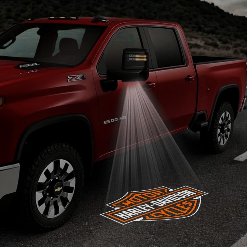 Pair of Chevrolet Silverado custom side wing mirror puddle lights with Harley-Davidson logo, designed for 2014-2026 trucks.