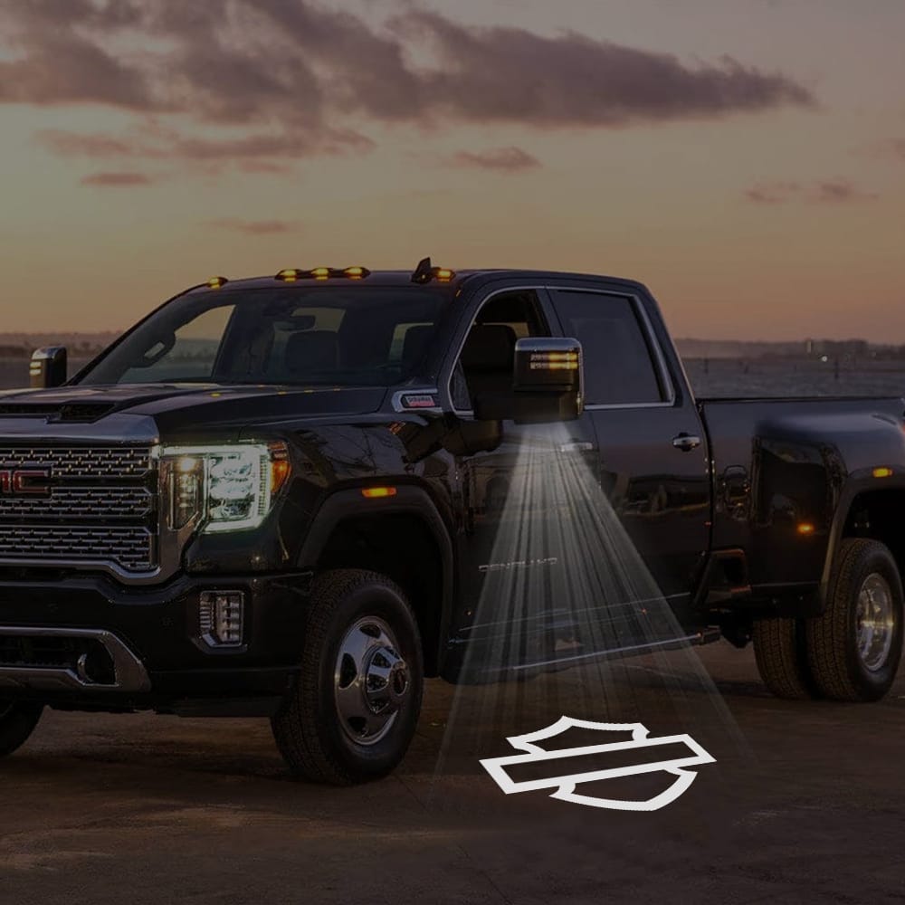 Pair of GMC Sierra custom side wing mirror puddle lights with Harley-Davidson logo, designed for 2015-2026 models, LED courtesy lights.