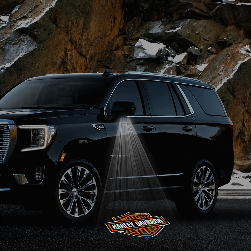 Pair of GMC Yukon premium side wing mirror puddle lights with Harley-Davidson logo, custom door courtesy lights for 2015-2026 models
